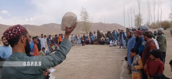 غور؛ رقابت های پرتاب سنگ با شتراک ۳۰ تن در ولسوالی شهرک برگزار شد