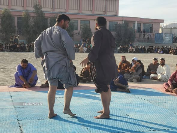 نیمروز؛ مسابقات کشتی میان ورزشکاران ولایت نیمروز و فراه در شهر زرنج برگزار شد